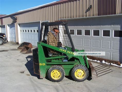 john deere 60 skid steer new holland lbs|New Holland Loaders Specs .